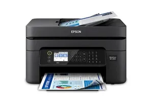 Black Epson wireless all-in-one printer printing a colour document, shown front-facing on a white background with a page loaded in the scanner bed.