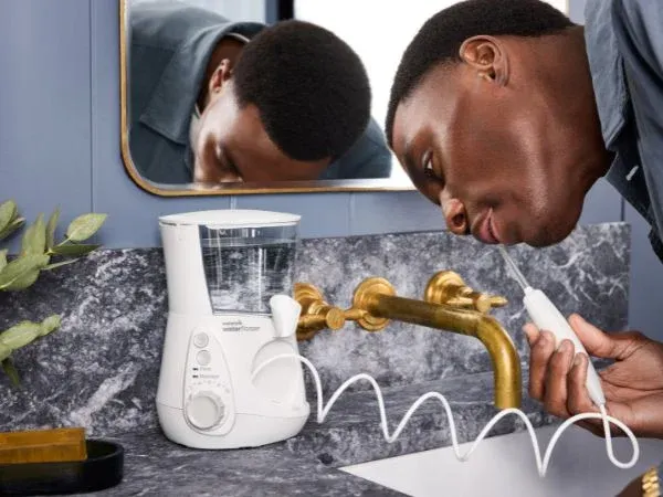 Comparison chart showing technical specifications of different Waterpik models